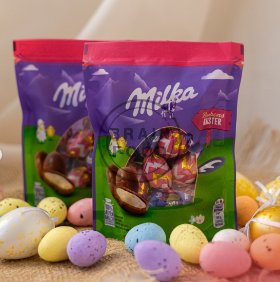 Шоколадные пасхальные яйца Milka Bonbons Knister Милка с молочной кремовой начинкой и взрывной карамелью 86 г id_4747 фото